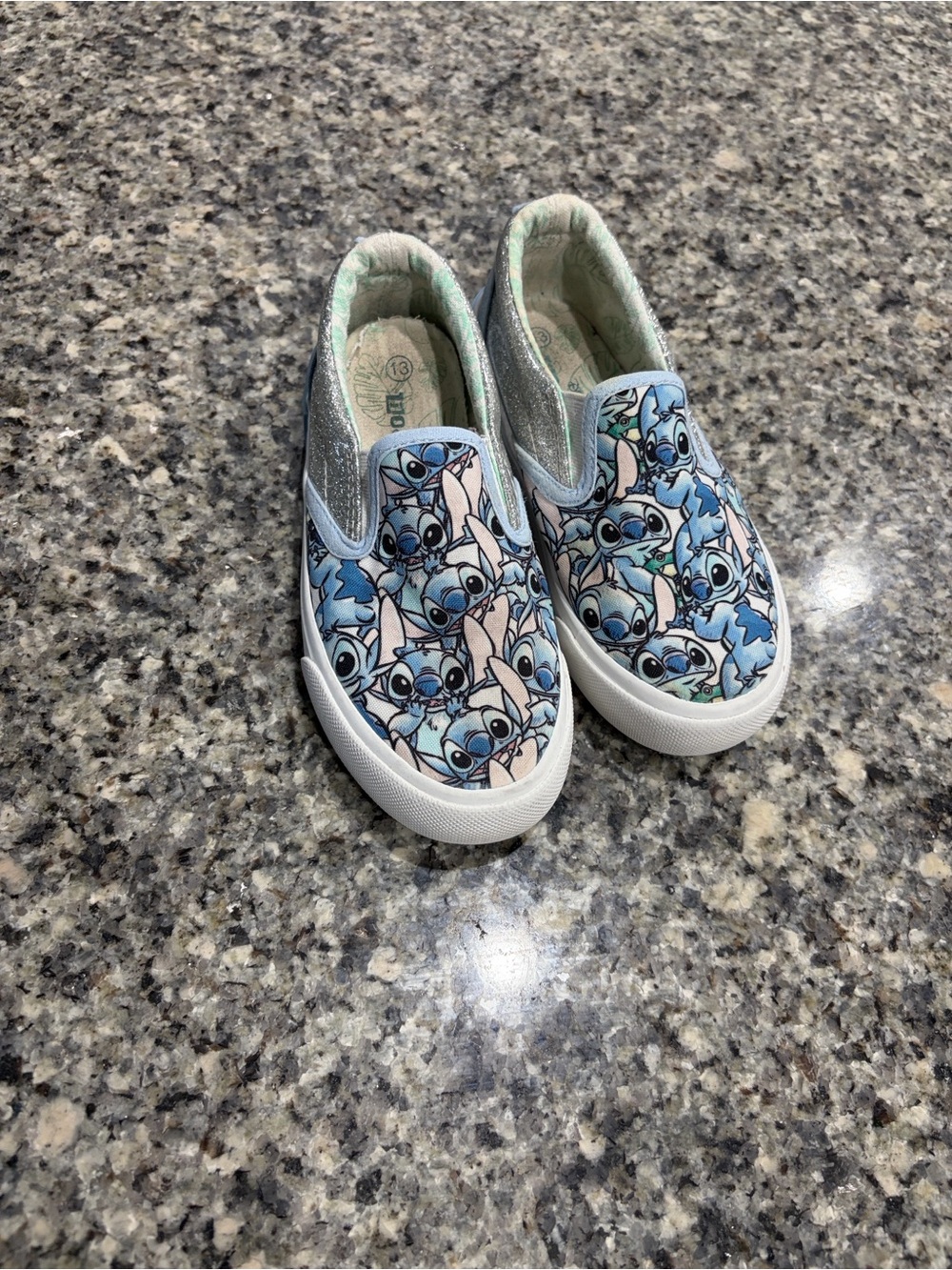 Disney Stitch Multi-Print Slip-On Sneakers in Blue and Silver
